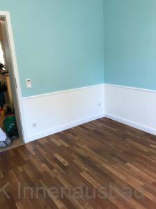 Verlegung von Parkettboden und Wandgestaltung mit Farbe